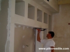 Preparare le pareti per pitturare: raschiature, rasature, carteggiata, fissativo - Muratore Imbianchino Roma 
